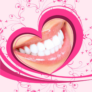 A beautiful, white smile is surrounded by a hot pink heart from which hot pink curliques and leaves extend.
