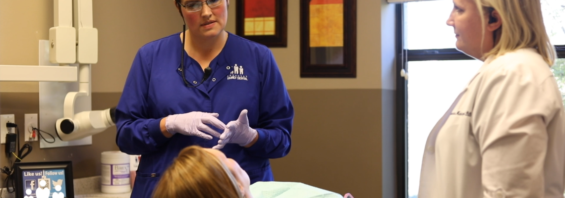 Arkansas Family Dental technician Nicole Shipp talks to a Little Rock, AR patient.