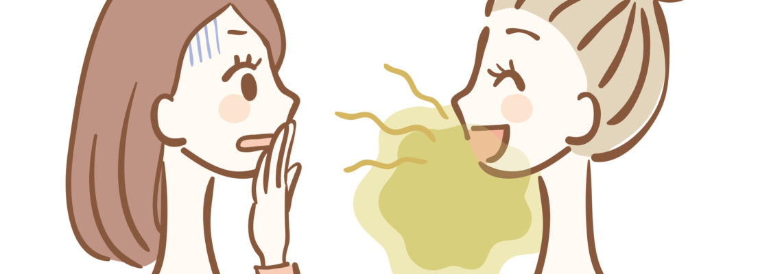 A cartoon woman is unaware of what causes her bad breath or that she has any, as the other woman notices it.