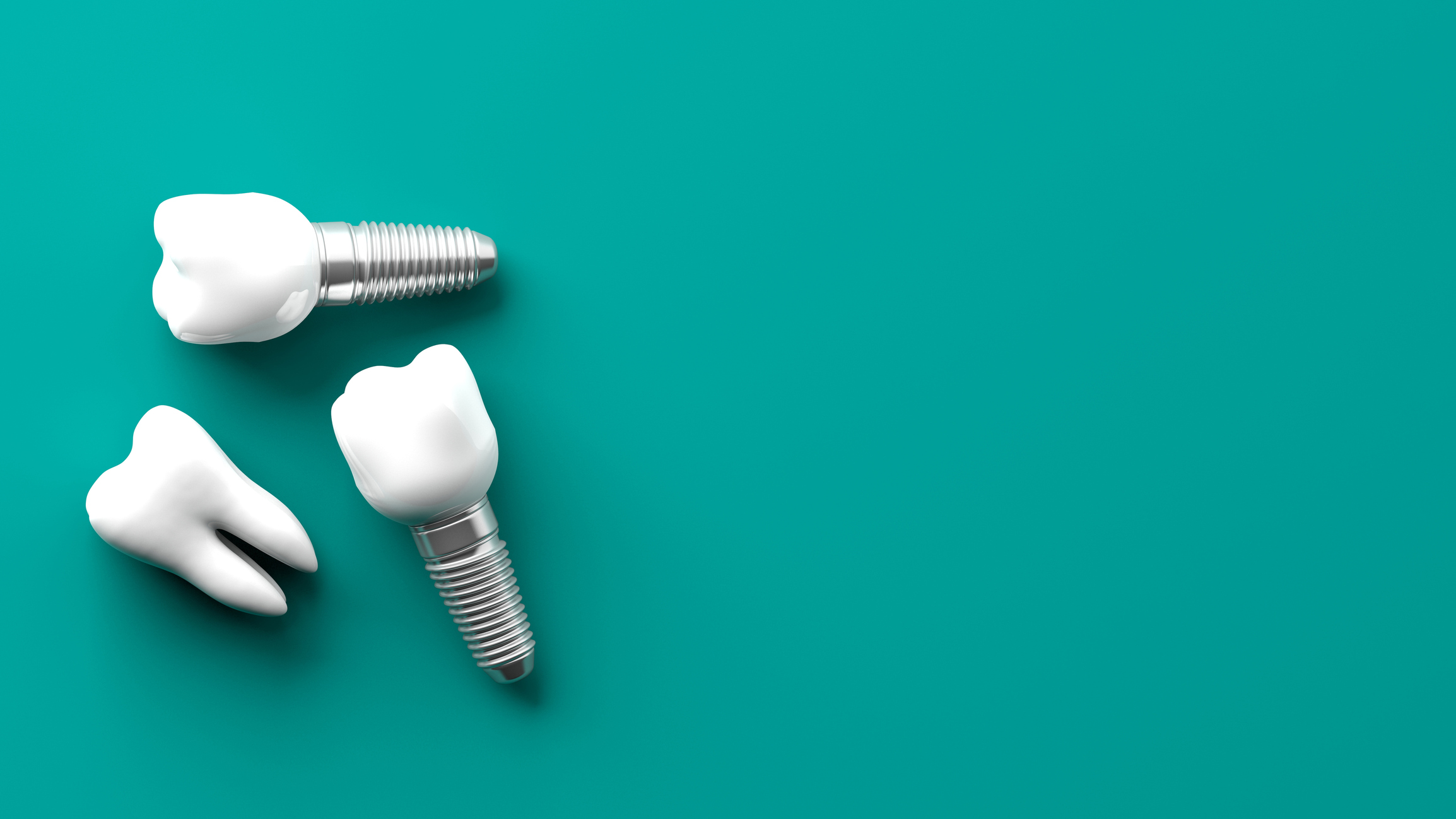 A tooth and two dental implants are isolated on a teal background.